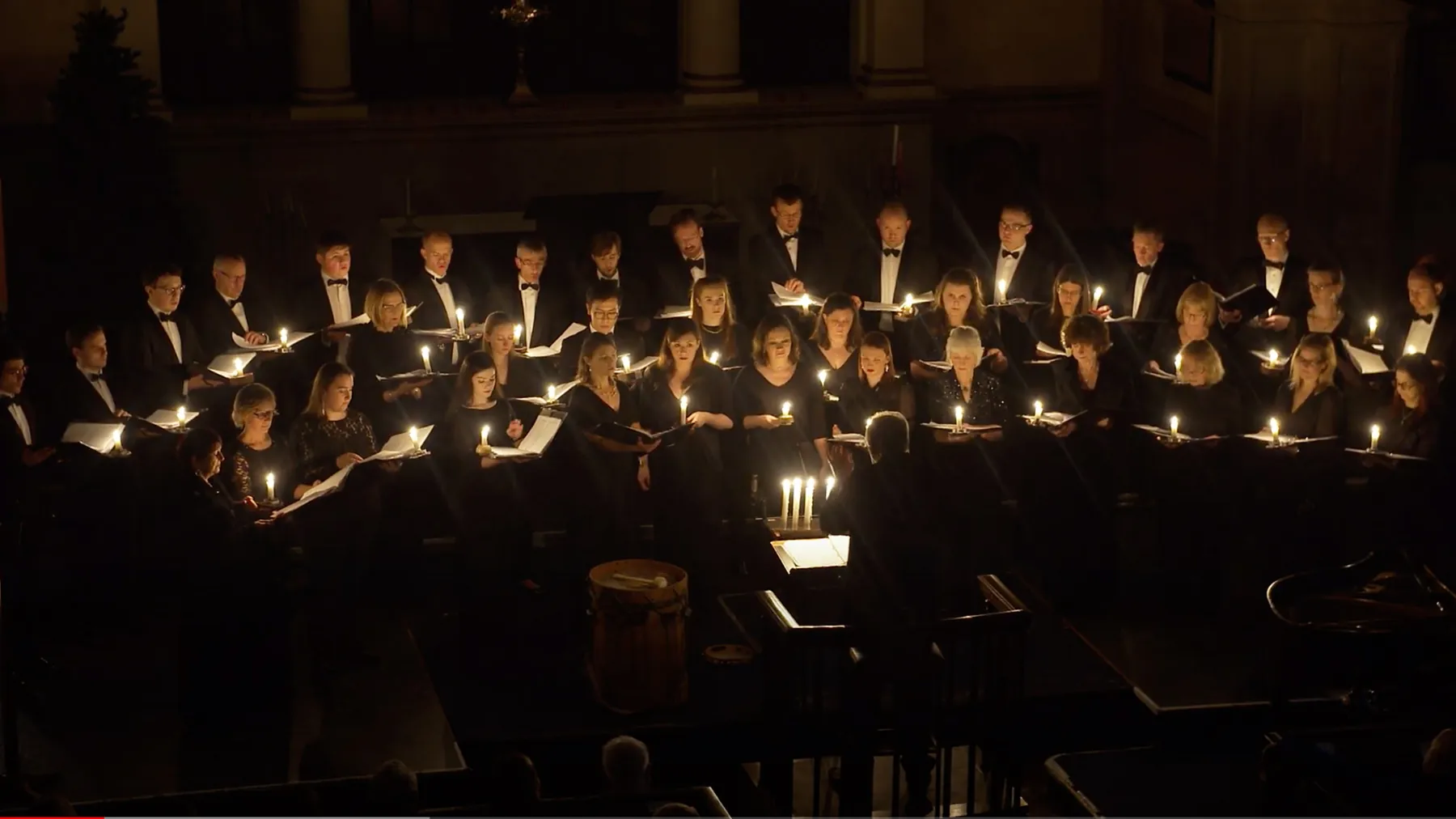 Ex Cathedra choir performing by candlelight